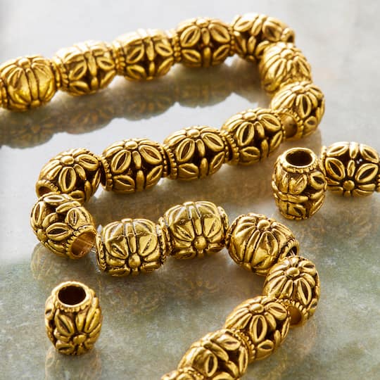 12 Pack: Gold Carved Flower Tube Beads, 10mm by Bead Landing™